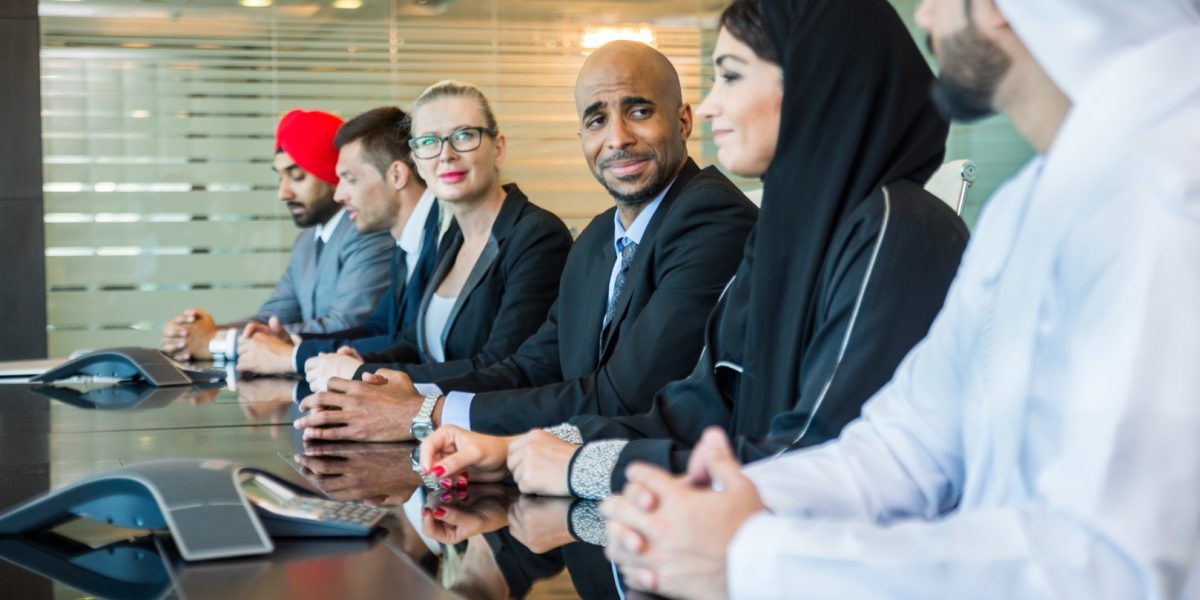 Multicultural business people meeting and talking about business - Multiracial business team meeting